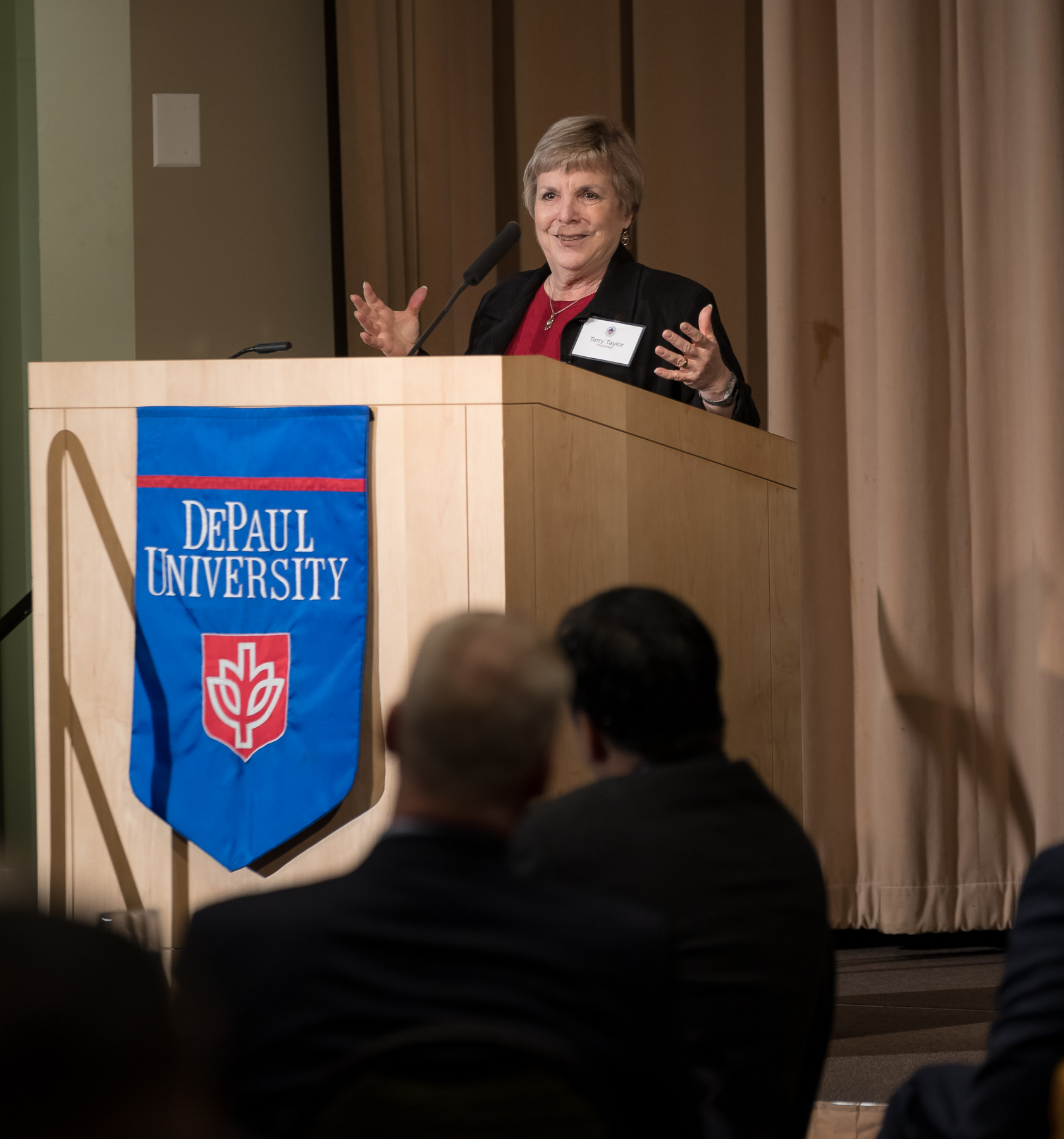 Terry Taylor, associate university librarian for Teaching, Learning and Research, offers her reflections on the past 25 years as DePaul University faculty and staff members are honored for their 25 years of service during a luncheon, Tuesday, Nov. 13, 2018, at the Lincoln Park Student Center. The honorees will have their names added to plaques located on the Loop and Lincoln Park Campuses. (DePaul University/Jeff Carrion)